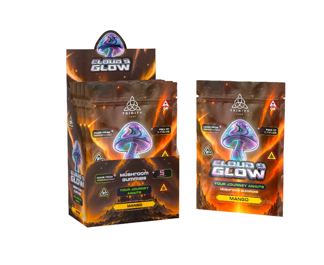 A display box and individual pouches of Trinity Mushrooms Cloud's Glow Mango disposable cannabis joints